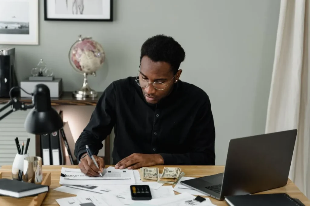 Accountant conducting client due diligence to manage money laundering risks