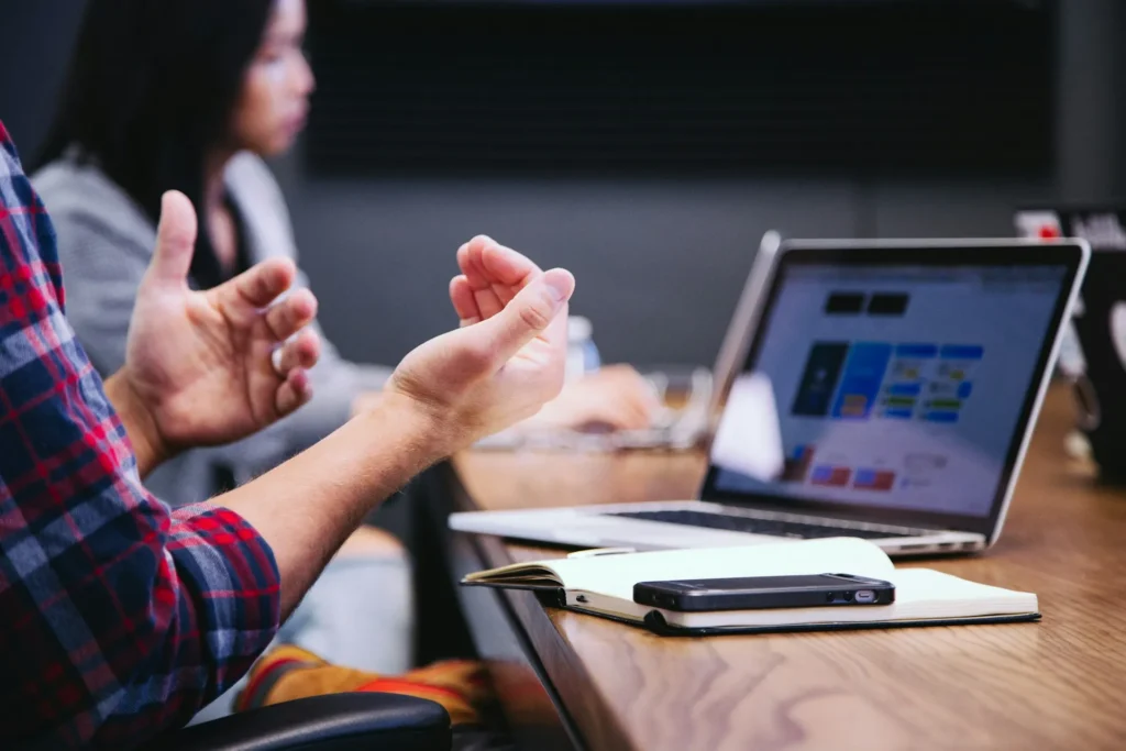 Australian business professionals reviewing AML/CTF Tranche 2 compliance requirements