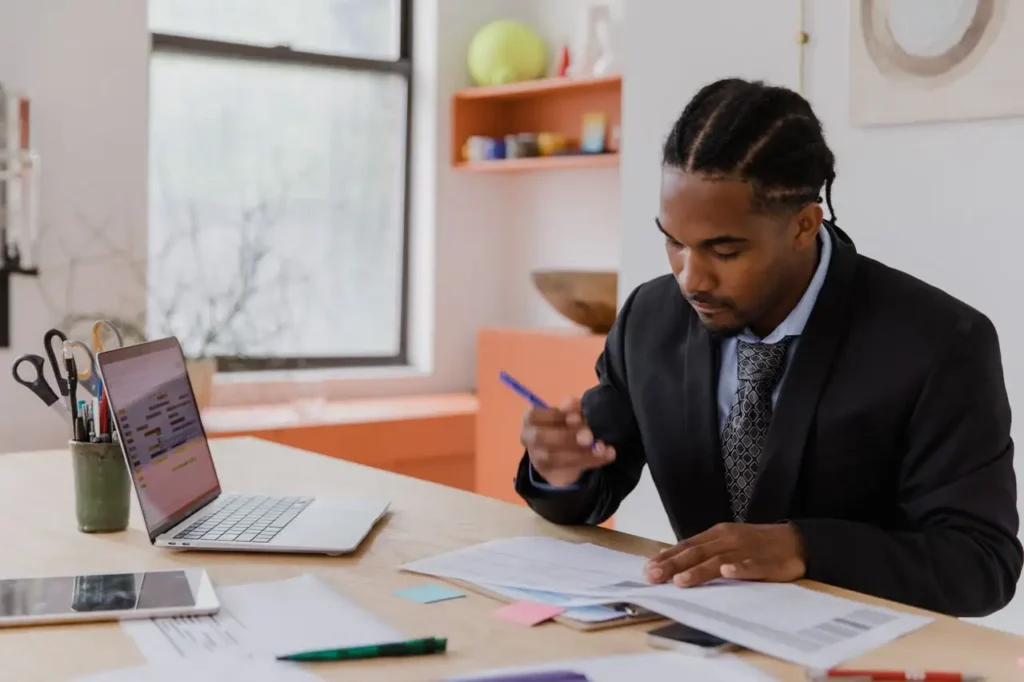 Business owner reviewing payroll processes and compliance requirements 