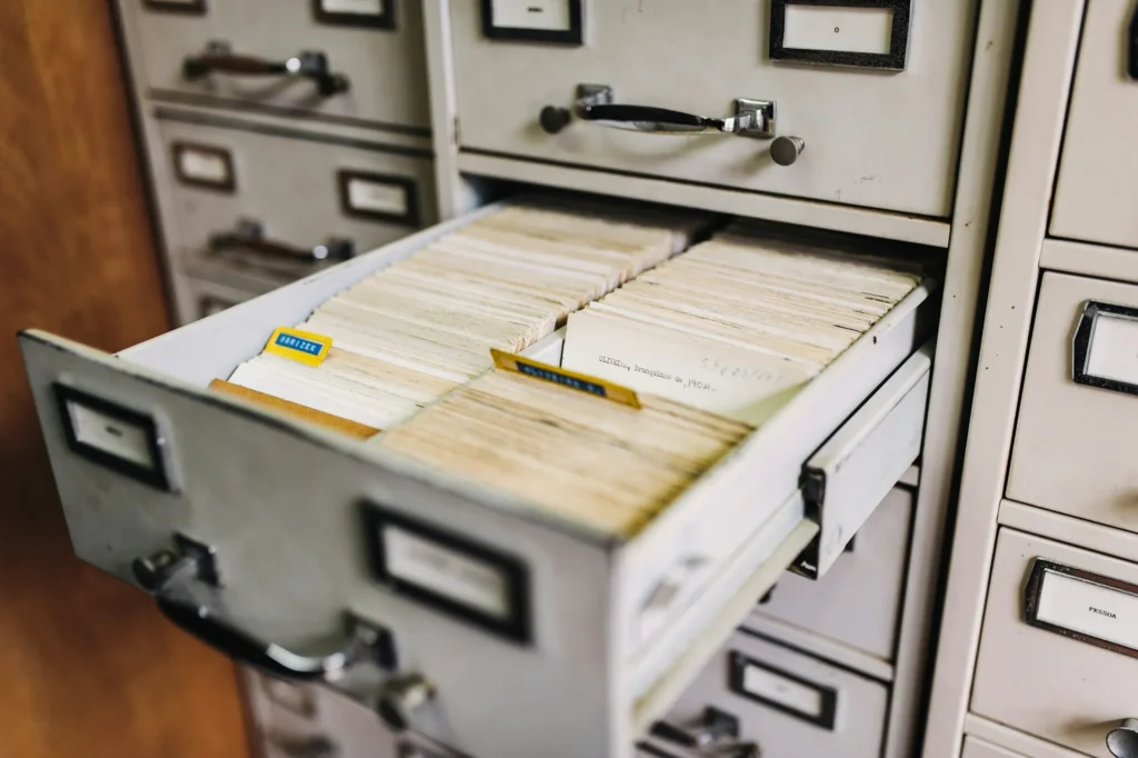 Organised archive of client records, representing the retention periods Australian accounting firms must meet under tax, professional conduct and anti-money laundering rules.