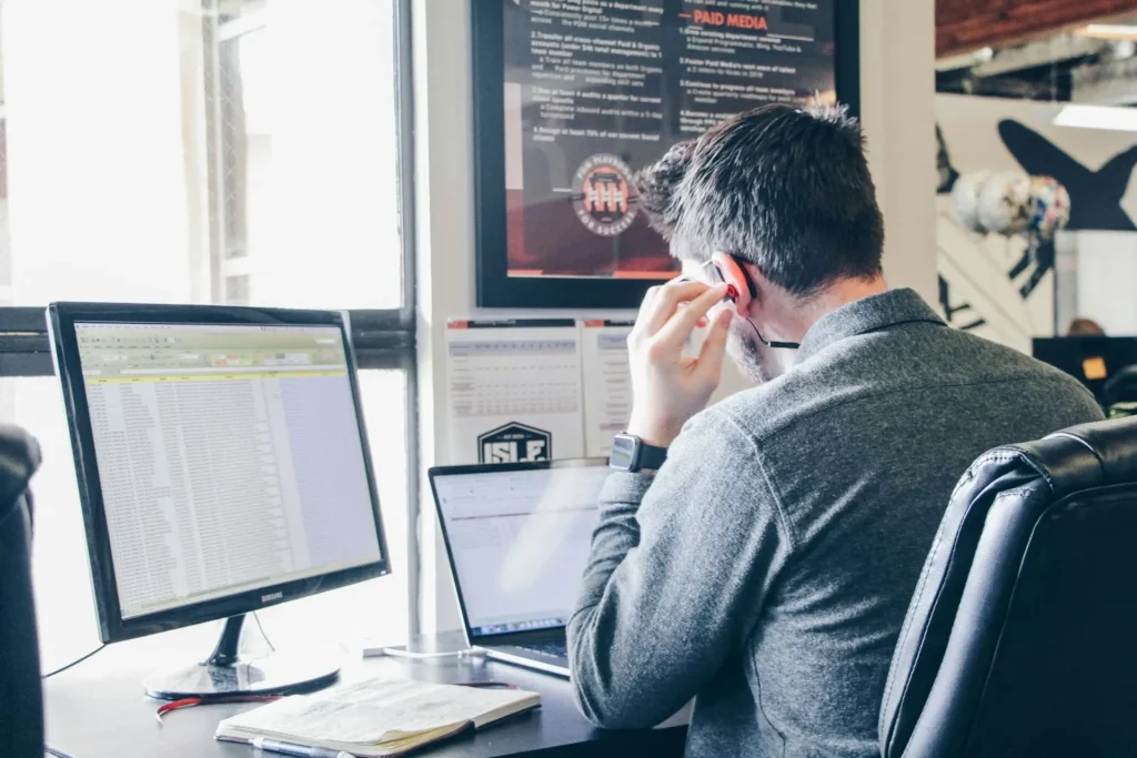 Accounting firm staff member reviewing automated workpapers before partner sign-off
